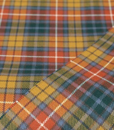 100% Buchanan Tartan Stoff aus Baumwolle in gelb, orange und grün, exportiert aus Multan, Pakistan.
